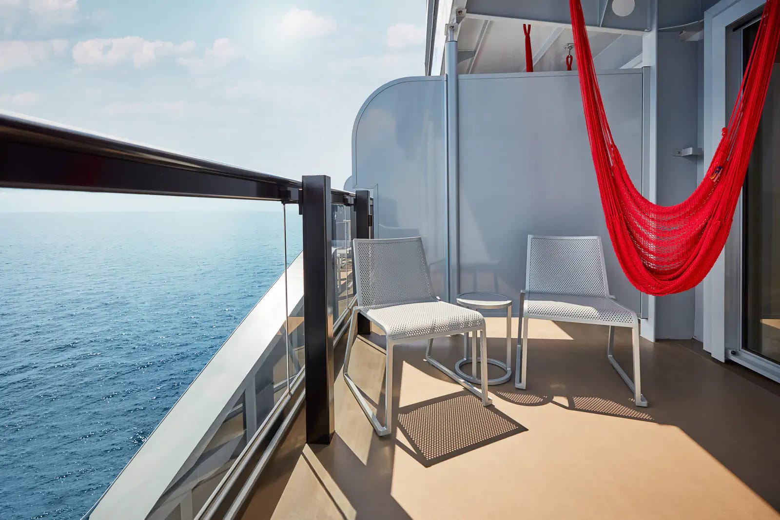 Swing on your hammock as you sail the oceans with a Sea Terrace room