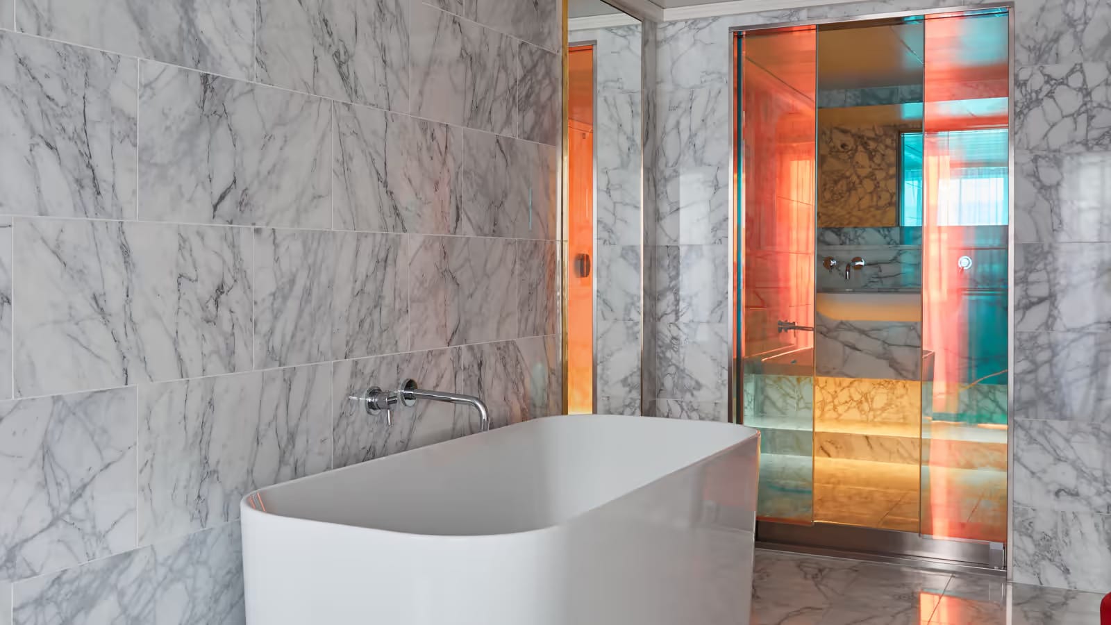 Indulge in your marble clad bathroom in your premium Rockstar suite