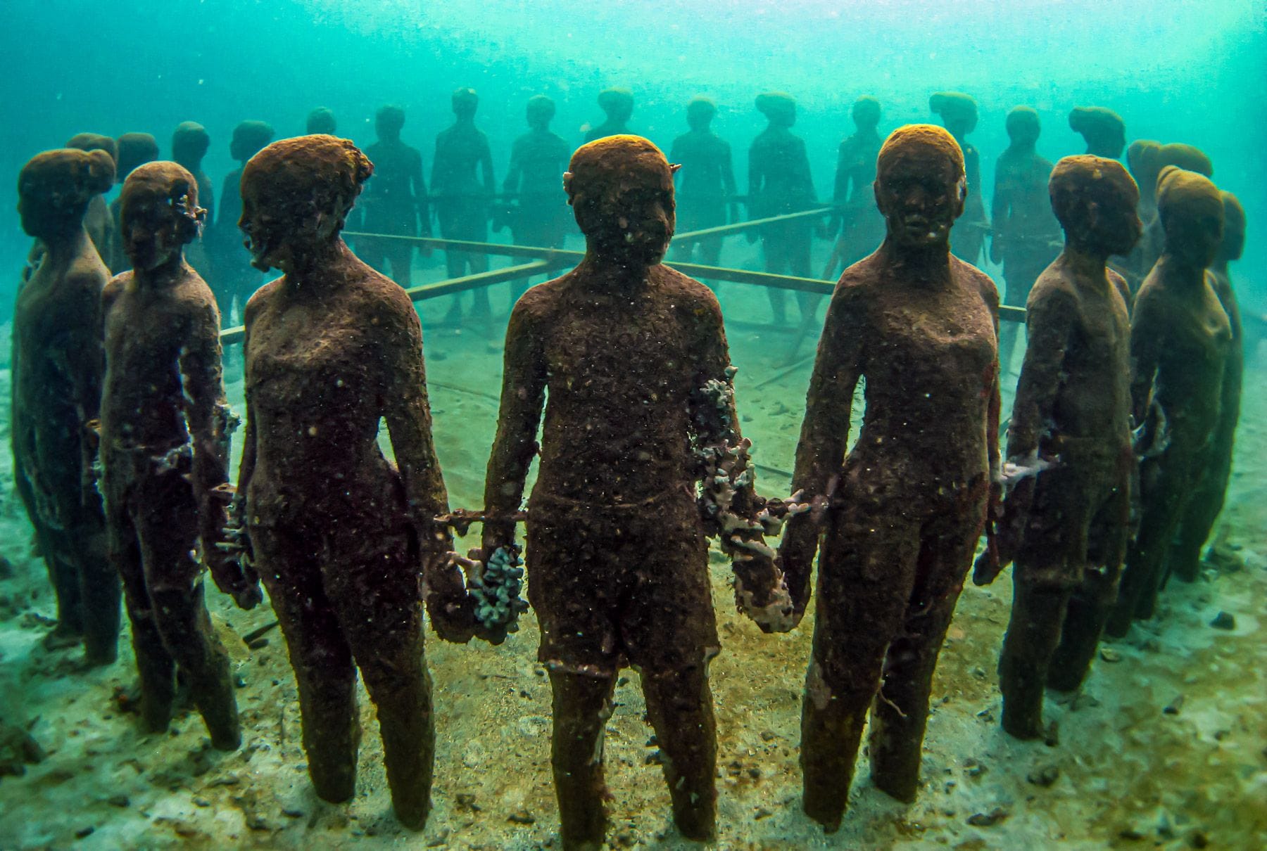Get onto a glass-bottomed boat or snorkel to see the wonders of the Underwater Sculpture Park